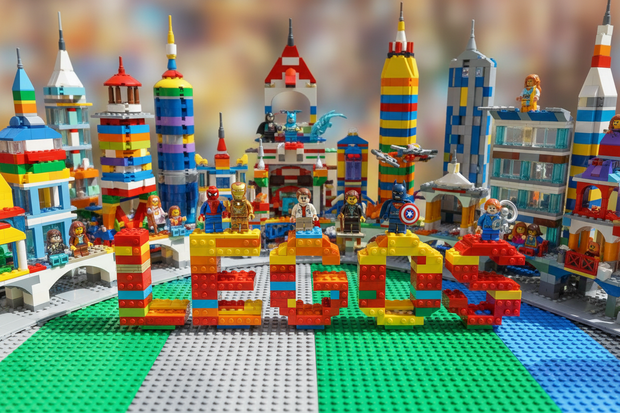 legos buildings all around and characters from marvel, dc, harry potter, all in lego form with the text legos in the middle made out of lego